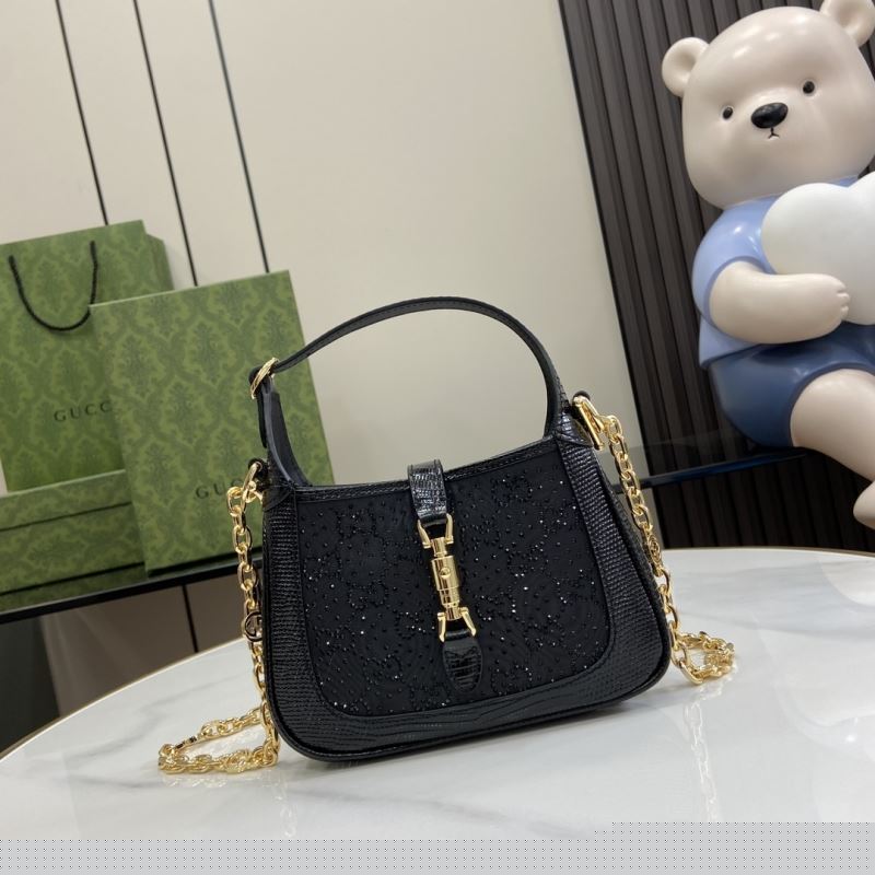 G*u*i top handle bags